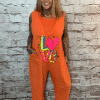 I Love It Jumpsuit best fits 18-28