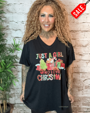 Who loves Christmas? V-neck t-shirt best fits 16-24
