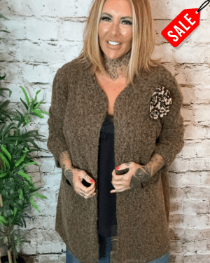Smaller Holly coat best fits 12-18 no returns on sale items