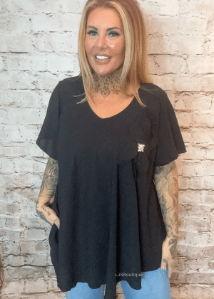 Lotus V-neck blouse best fits 16-24