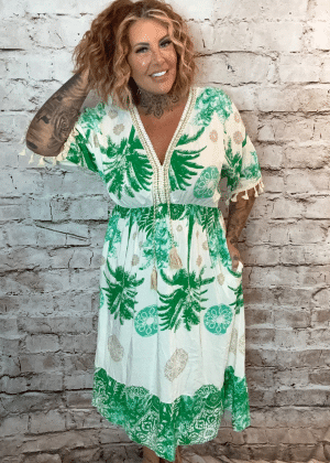 Mimosa dress best fits 12-20 No Returns on sale items