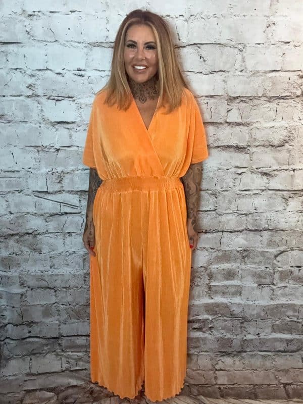 Elliana pleated jumpsuit best fits 16-24