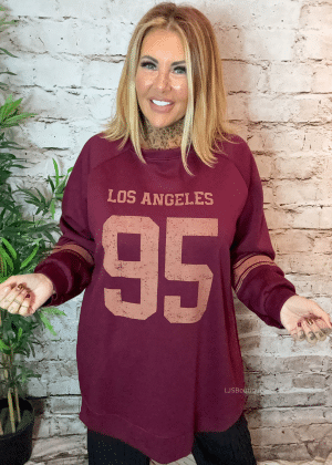 Los Angeles oversized sweater best fits 16-26
