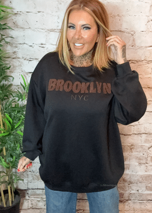 Brooklyn sweater best fits  16-24