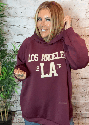 LA oversized sweater best fits 16-26