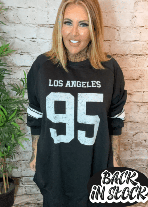 Los Angeles oversized sweater best fits 16-26