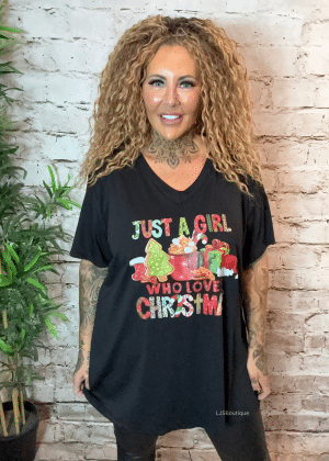 Who loves Christmas? V-neck t-shirt best fits 16-24