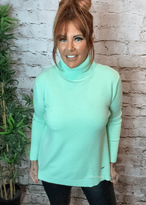 Ruby Turtle neck spring jumper best fits 12-20