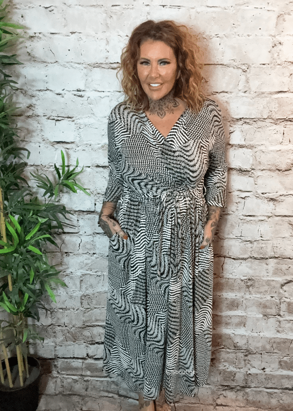 Ebony wrap dress best fits 16-24