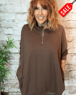 Abbie sweater best fits 16-26