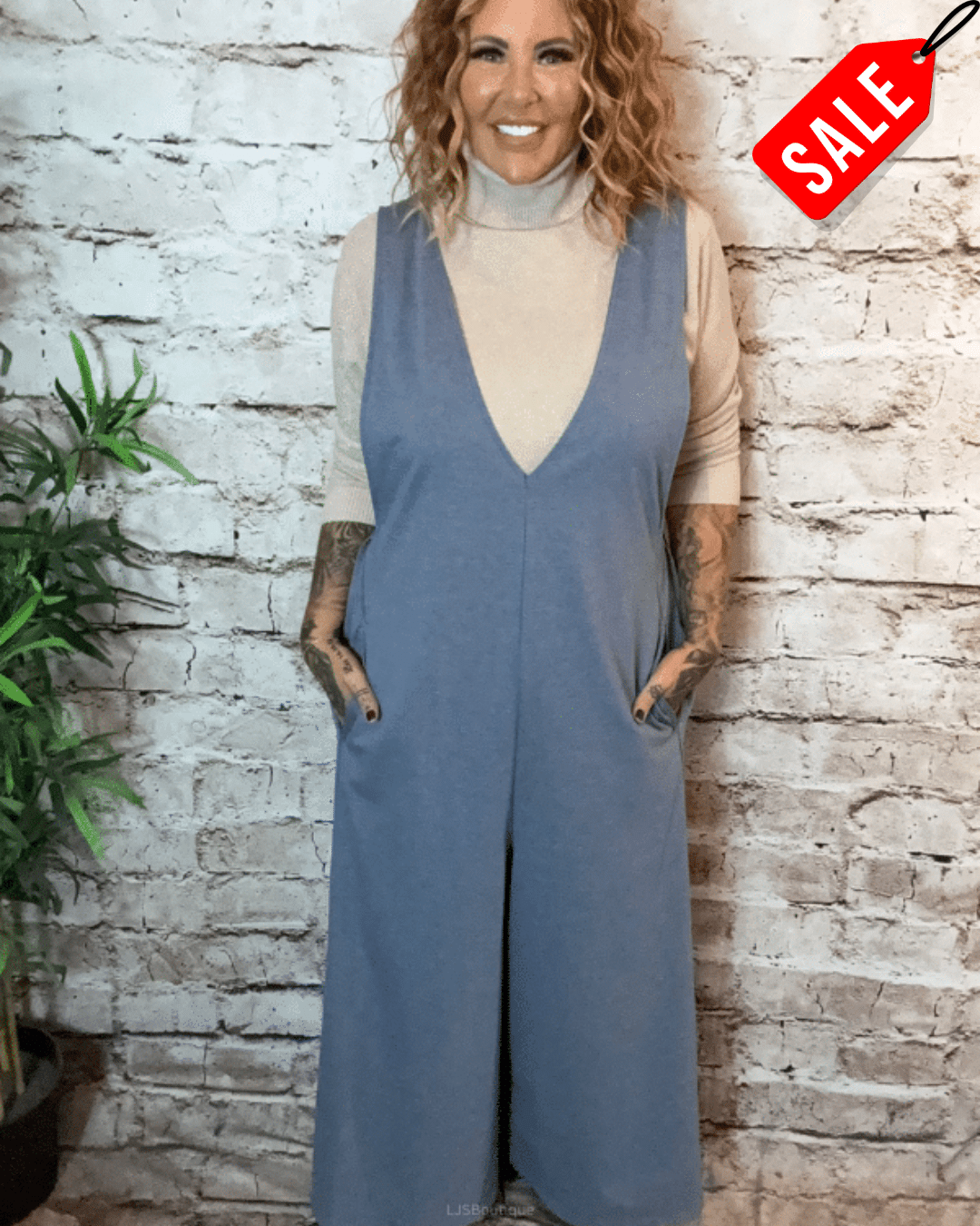 Trinity jumpsuit best fits 14-22