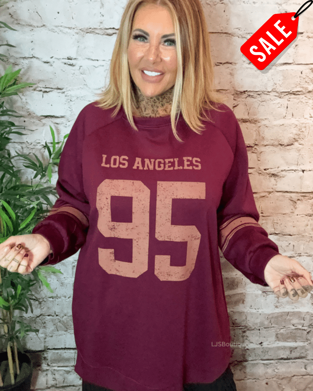 Los Angeles oversized sweater best fits 16-26