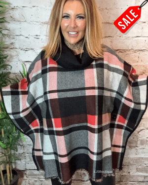 Monica poncho best fits  16-22 NO RETURNS ON SALE ITEMS