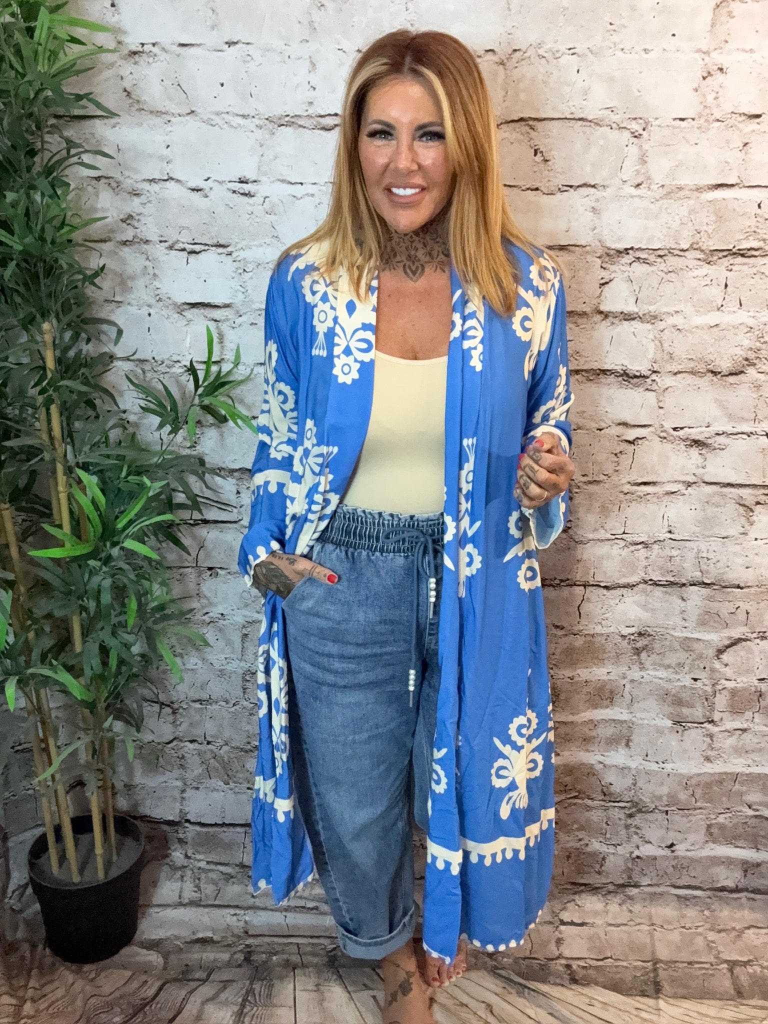 Ophelia duster coat best fits 16-24